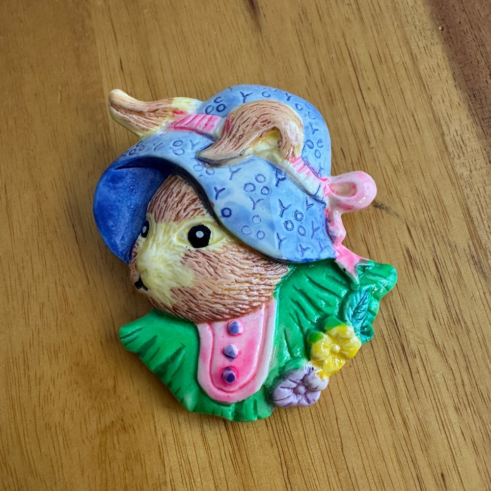 Vintage ceramic bunny rabbit with a bonnet pin brooch‎